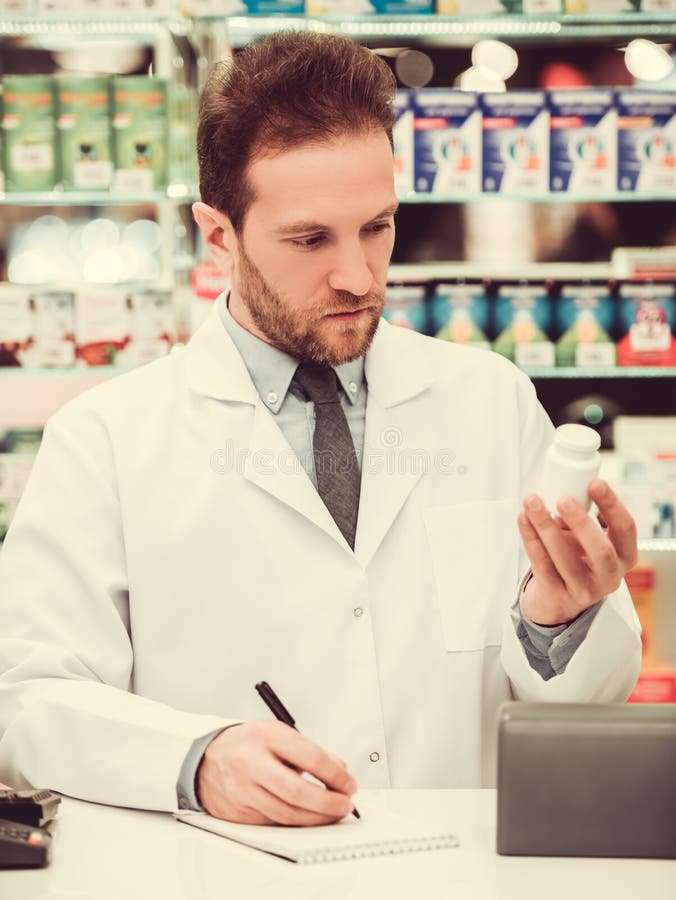 Handsome Pharmacist at Work Stock Photo - Image of help, counter: 91339482