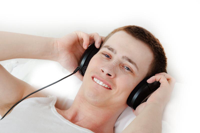 Handsome student enjoying music stock photos Handsome student enjoying music stock photos