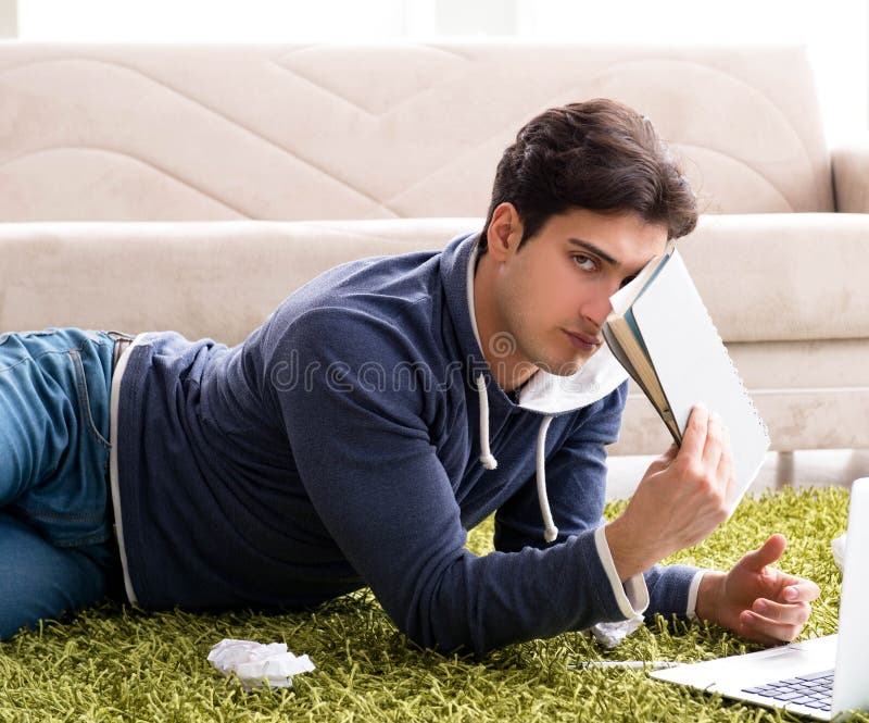 Handsome student working at startup project at home royalty free stock photos