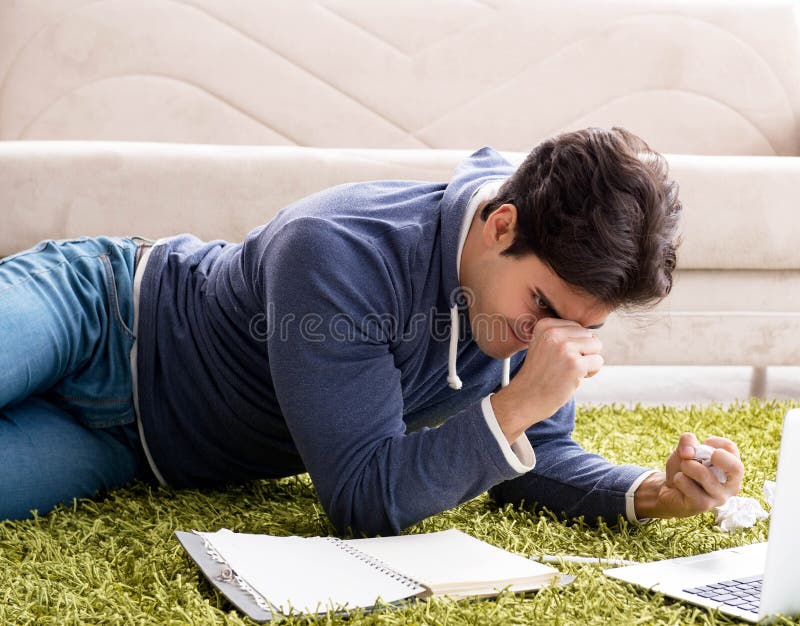 Handsome student working at startup project at home royalty free stock images