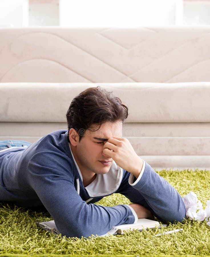 Handsome student working at startup project at home royalty free stock image