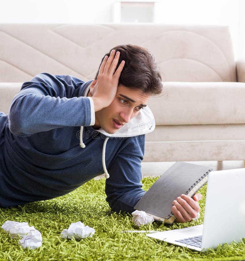 Handsome student working at startup project at home royalty free stock photos