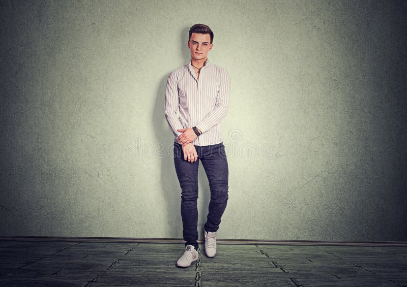 Handsome stylish man in shirt and denim stock photos Handsome stylish man in shirt and denim stock photos