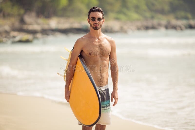 Surfer Man with Surfboard on Sea Coast. Stock Photo - Image of surfer ...