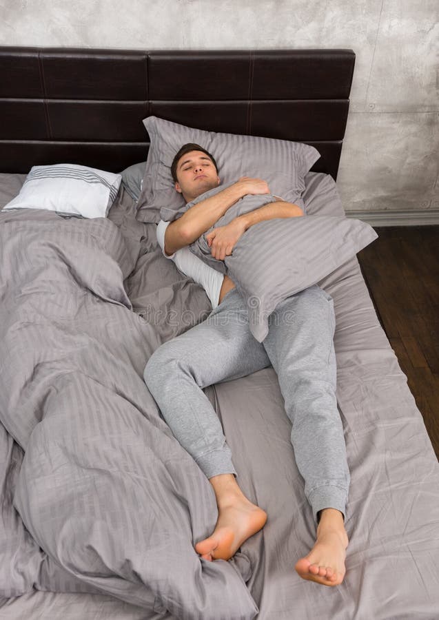 Handsome Young Tired Man Pajama Sleeping Alone Stock Photos - Free ...