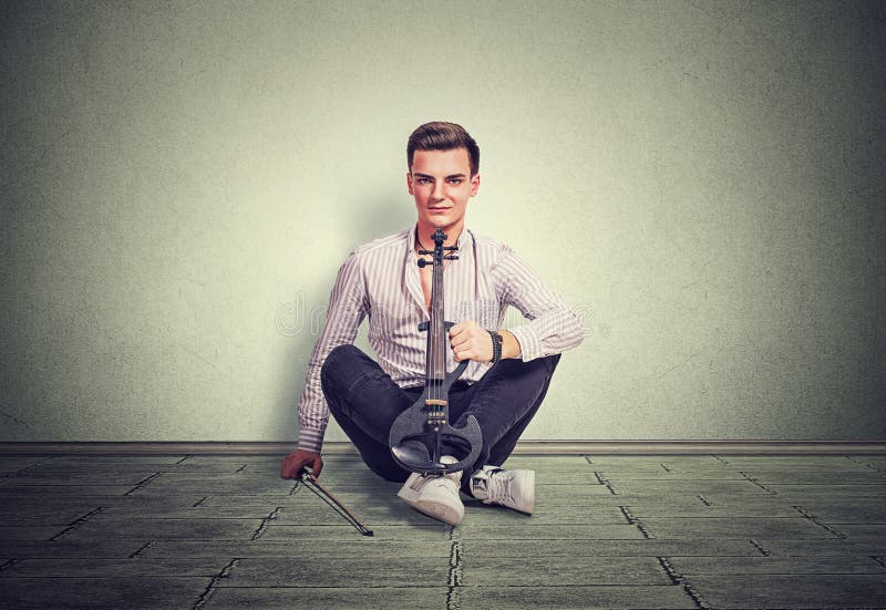 Modern young man with violin royalty free stock image Modern young man with violin royalty free stock image