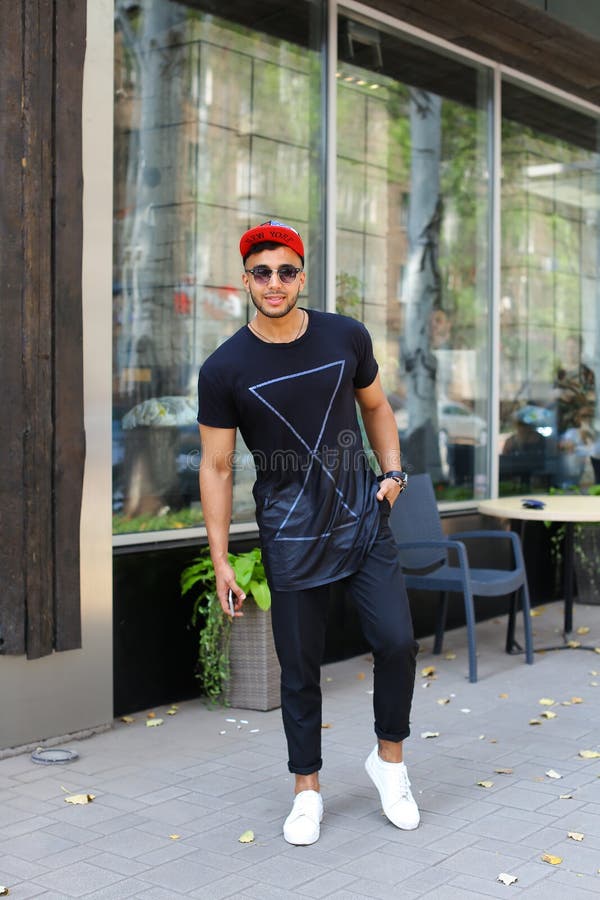 Handsome Young Arabic Muslim Man Goes on Road, Smiles in Camera, Stock ...