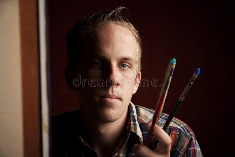 Handsome young artist royalty free stock photos