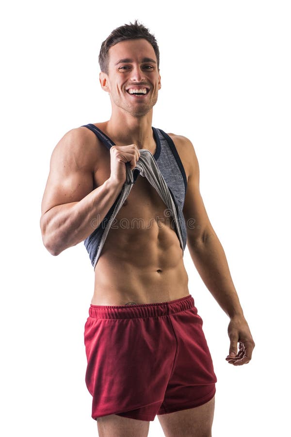 Handsome young man with strong fitness Show off your 6-pack abs in the gym.  29631744 Stock Photo at Vecteezy