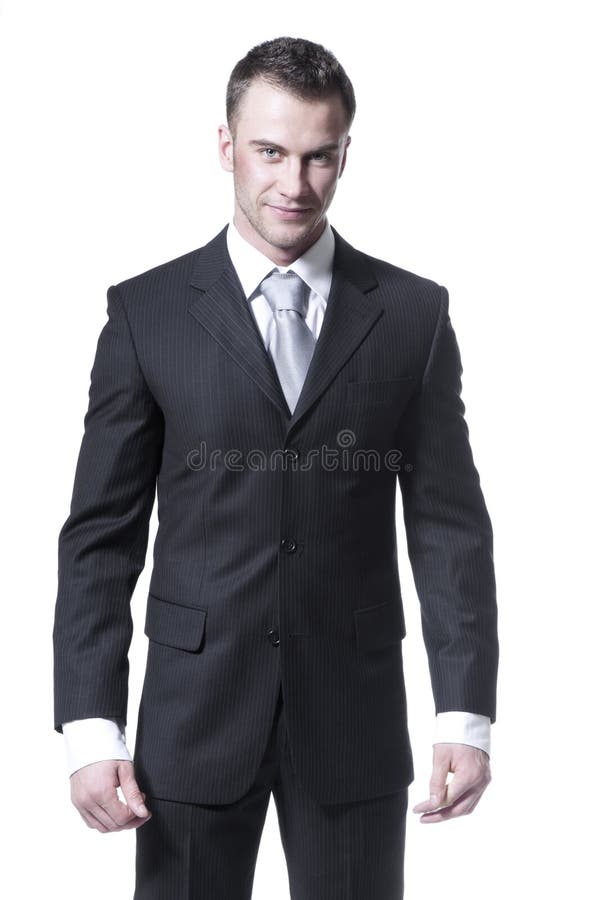 Handsome young businessman in black suit