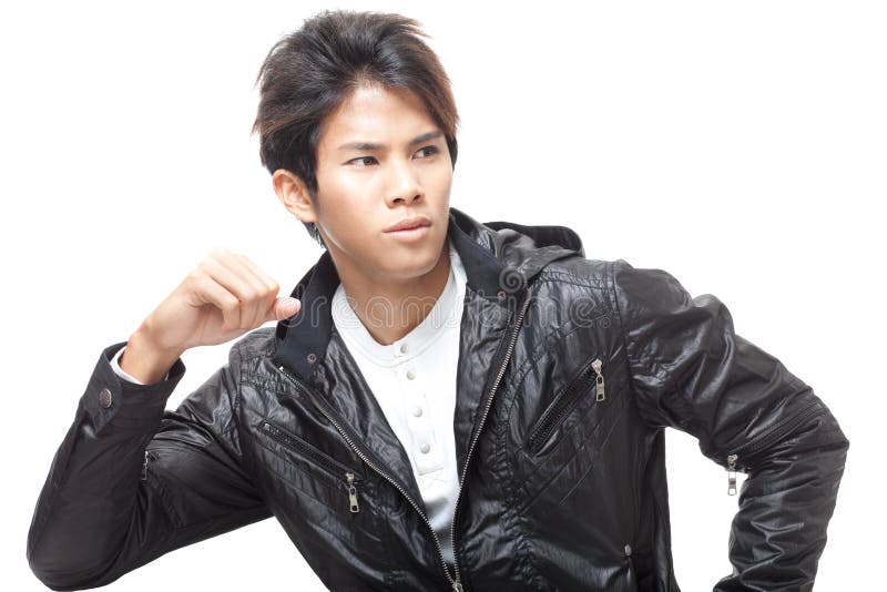 Handsome young chinese man in black leather jacket stock image