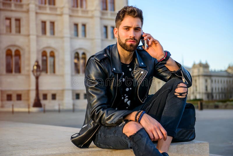 Young Man Siting on the Stairs Stock Image - Image of facial, jacket ...