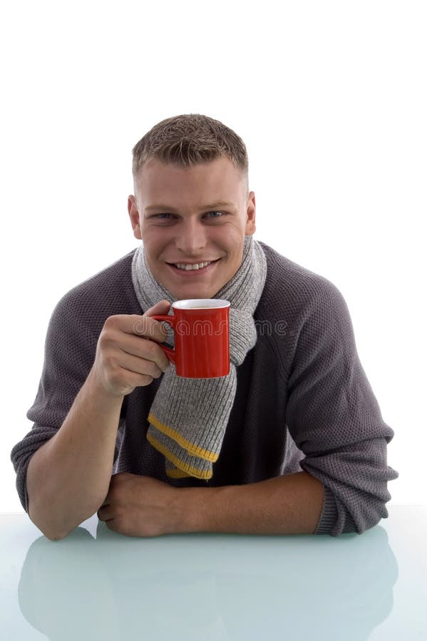 Young Man Holding Two Cups Of Coffee In A Coffee Cup Holder Stock