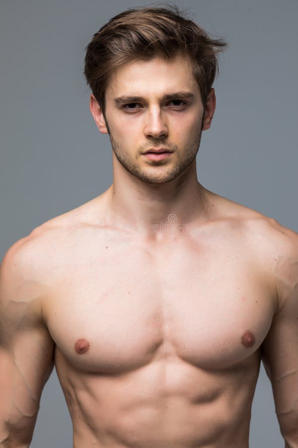 A Handsome Nude Man Lying in a Bed. Stock Photo - Image of people, hair