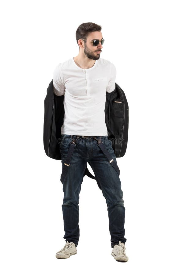 Handsome young man taking off jacket