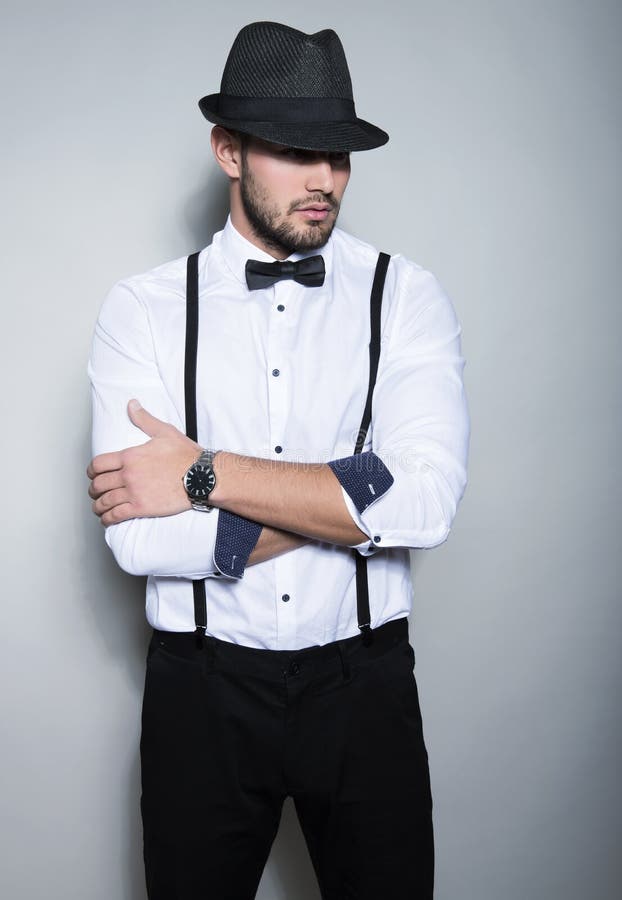 Handsome Young Man Wearing Hat Stock Photo - Image of company, modern ...