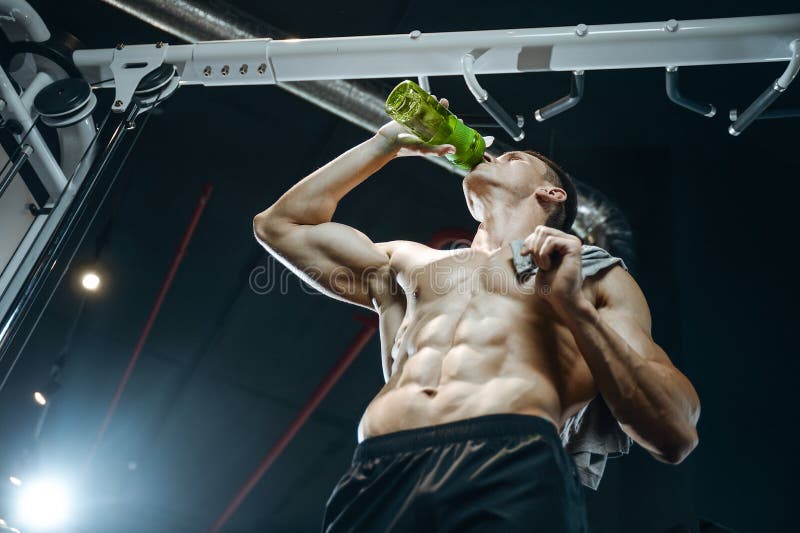 Fitness Man Gym Drinking Water Workout Fitness Bodybuilding Healthy  Background Stock Photo by ©antondotsenko 431519974