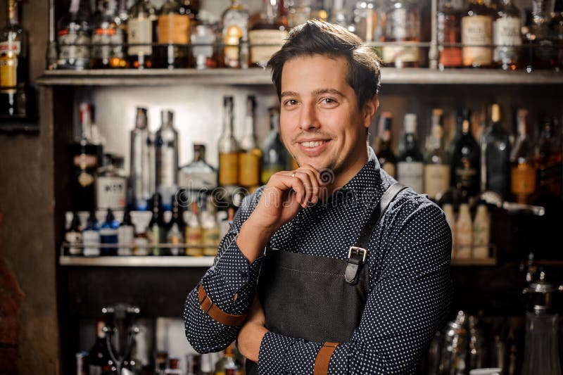 Handsome and young smiling brown haired bartender stock photos Handsome and young smiling brown haired bartender stock photos