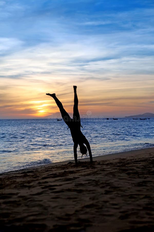 Handstand on the beach