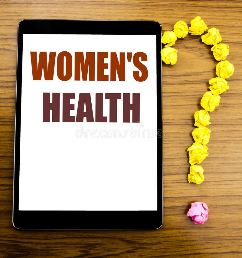 Handwriting Announcement text showing Women s Health. Business concept for Female Celebration Written on tablet with wooden backg royalty free stock photo