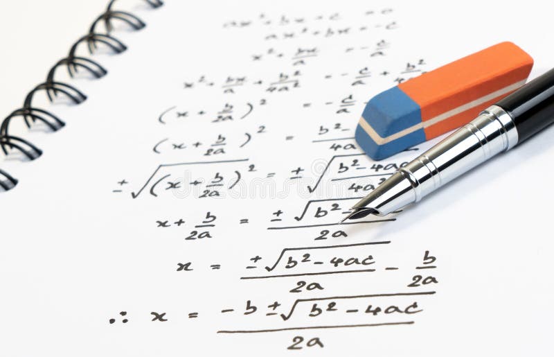 Handwriting of mathematics quadratic equation formula on examination, practice, quiz or test in math class.