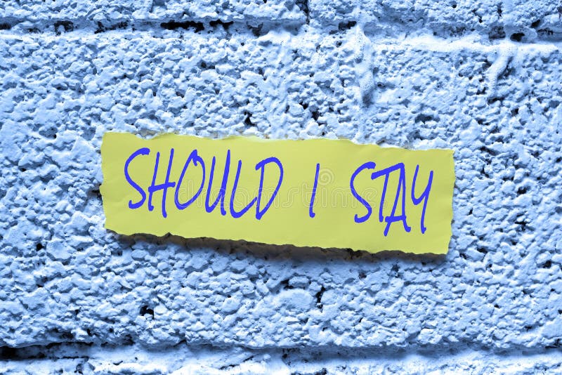 Handwriting text Should I Stay. Concept meaning Looking for reasons to remain on a place Doubtful Indecision Important. Sign displaying Should I Stay, Business overview Looking for reasons to remain on a place Doubtful Indecision Important Message Presented On Notepad With Paperwraps All Aroud.