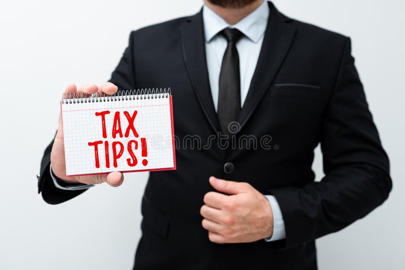 Handwriting text Tax Tips. Business overview compulsory contribution to state revenue levied by government Presenting stock photo