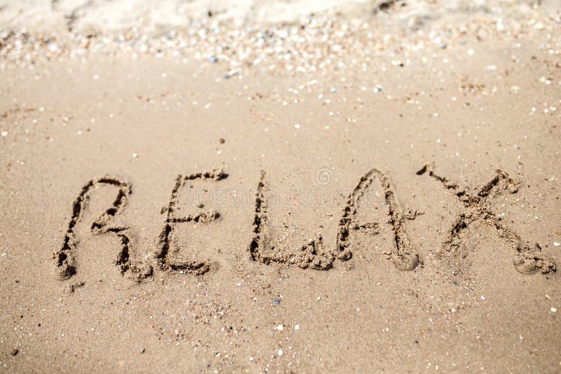 Handwritten Relax Word on the Sand Coast. Wonderful Words on Beach Sand ...