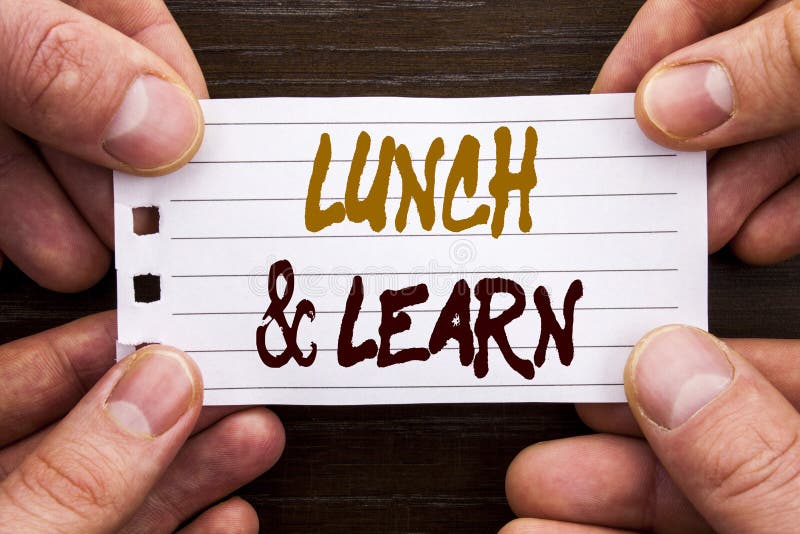 Handwritten text sign showing Lunch And Learn. Business concept for Presentation Training Board Course written on Sticky Note Pape royalty free stock image