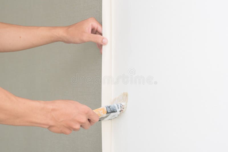 Handyman Putting Up Wallpaper on the White Walls Stock Image Image of