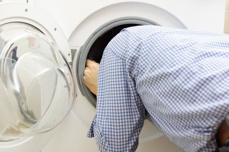 Repairman Servicing Washing Machine Stock Photo Image of maintenance