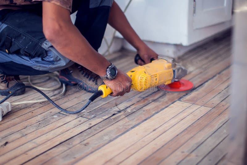 Handyman Sanding Floor. Repairs and Renovation Work Stock Image Image