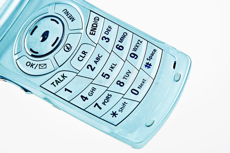 Blue cellular phone inside number pad isolated against a white background. Blue cellular phone inside number pad isolated against a white background.