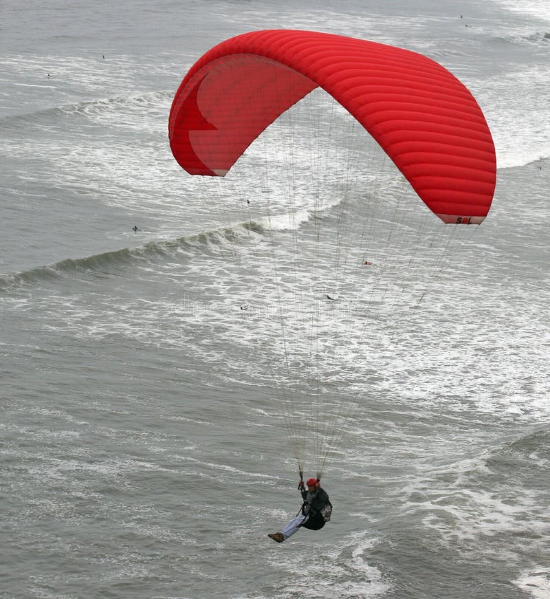 Hang Gliding Over Ocean stock photo. Image of wind, glide 1050502