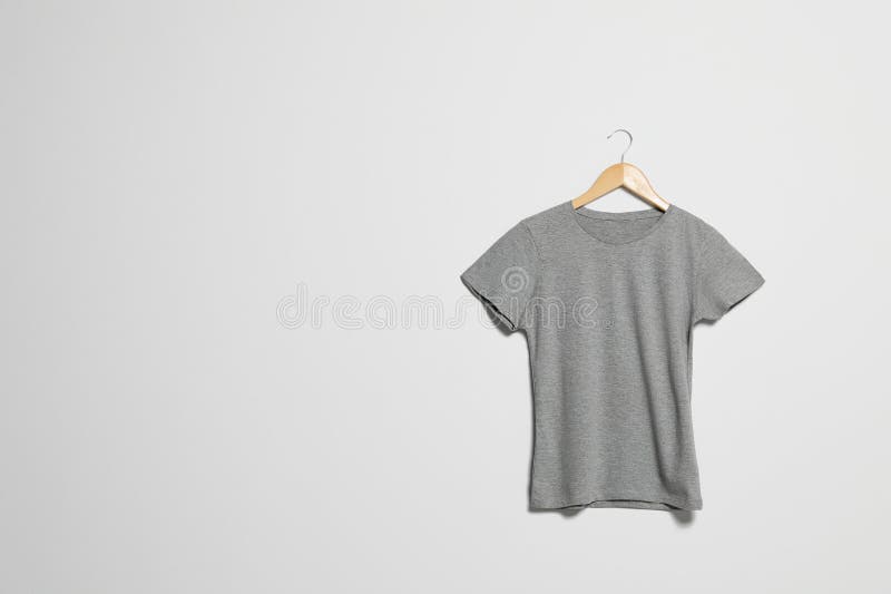 https://thumbs.dreamstime.com/b/hanger-grey-t-shirt-light-wall-mockup-design-hanger-grey-t-shirt-light-wall-mockup-design-269486688.jpg