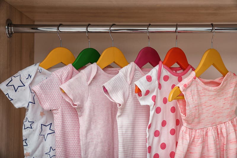 Baby Clothes Hanging On Rack Store Stock Photo 1936987804