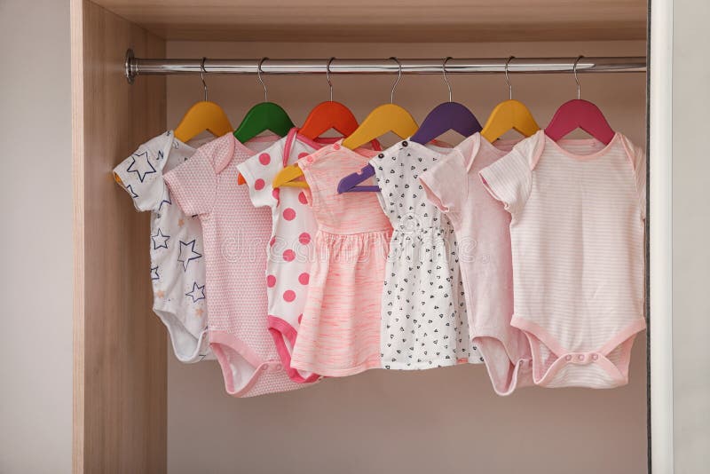 Hangers with Baby Clothes in Wardrobe Stock Image - Image of keeping,  hangers: 132765883