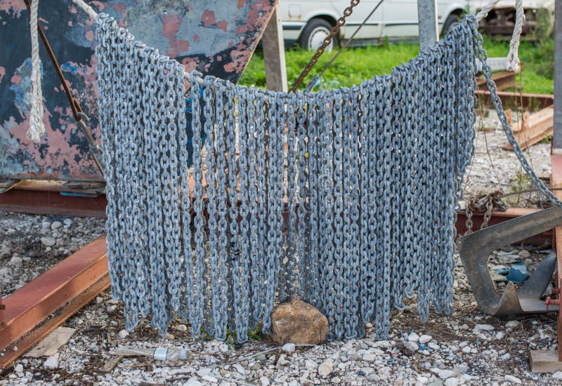 Hanging Anchor Chain in Winter Storage at the Shipyard Stock Photo - Image  of metal, chain: 168135690