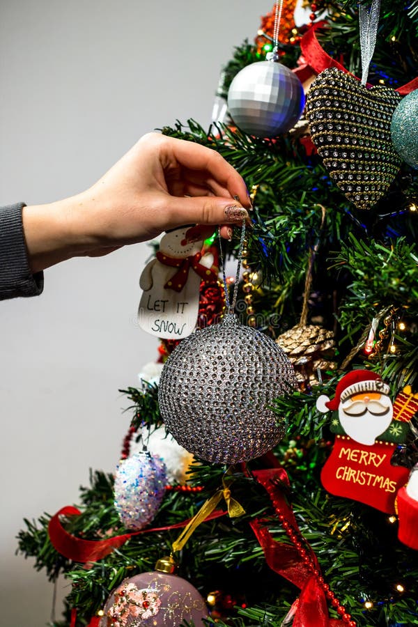 Hanging Christmas Decorations and Ornaments in the Christmas Tree Stock