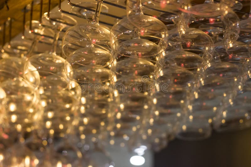 Hanging glasses above a bar royalty free stock images Hanging glasses above a bar royalty free stock images