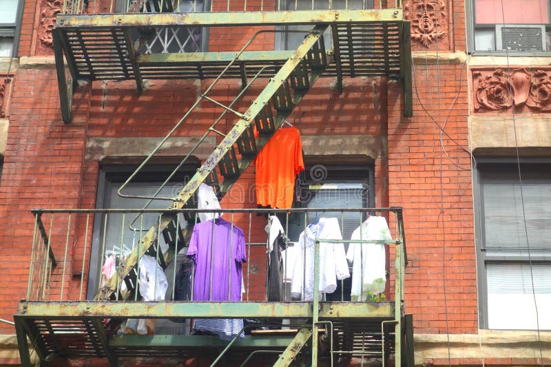 Laundry Day in New York City, Clothes Drying on a Manhattan Rooftop, among Graffiti and