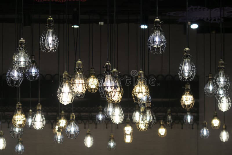 Row of Hanging Lights stock photo. Image of orange, illuminated 12987464