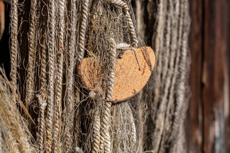 Old Fishing Net is Hanging on the Wood Wall Stock Photo - Image of