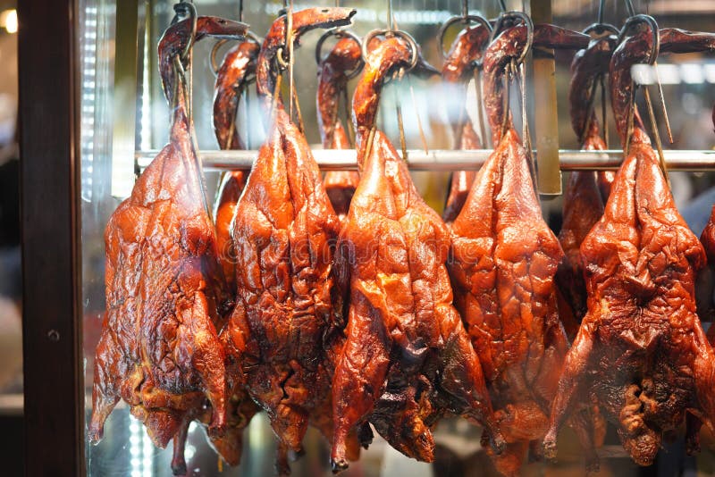 hanging-roast-ducks-rack-restaurant-183072972.jpg