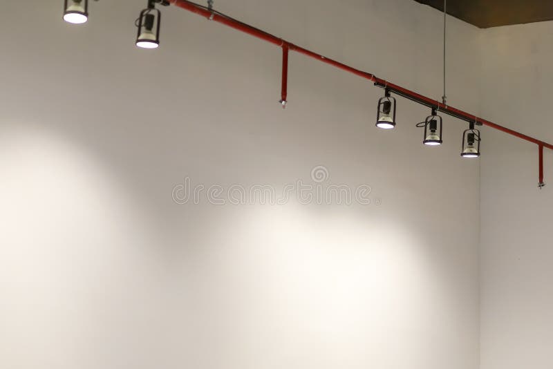 Hanging Studio Lights in the White Room, the Light Shone Stock Photo