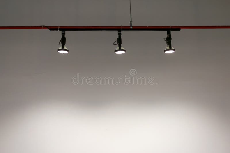 Hanging Studio Lights in the White Room, the Light Shone Stock Photo