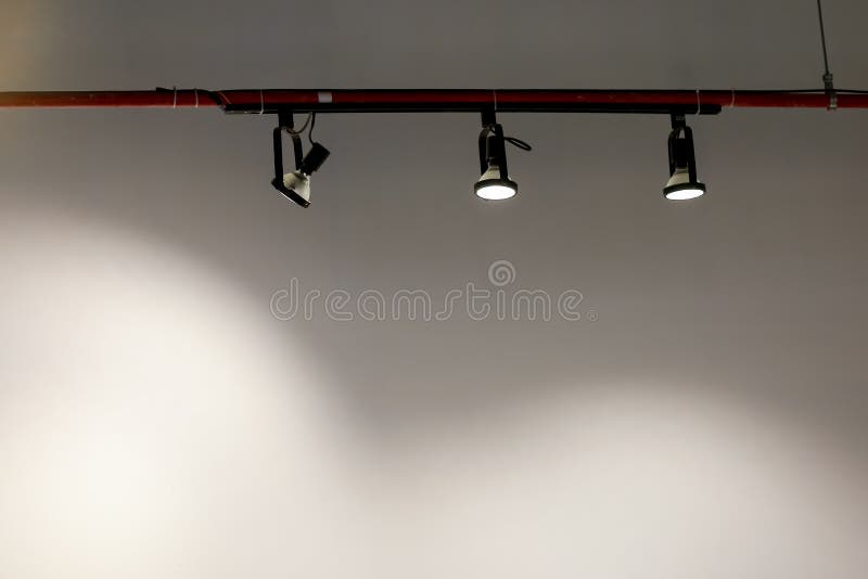 Hanging Studio Lights in the White Room, the Light Shone Stock Photo