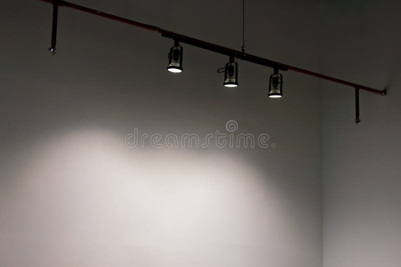 Hanging Studio Lights in the White Room, the Light Shone Stock Photo