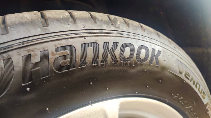 Hankook tire brand logo sign background