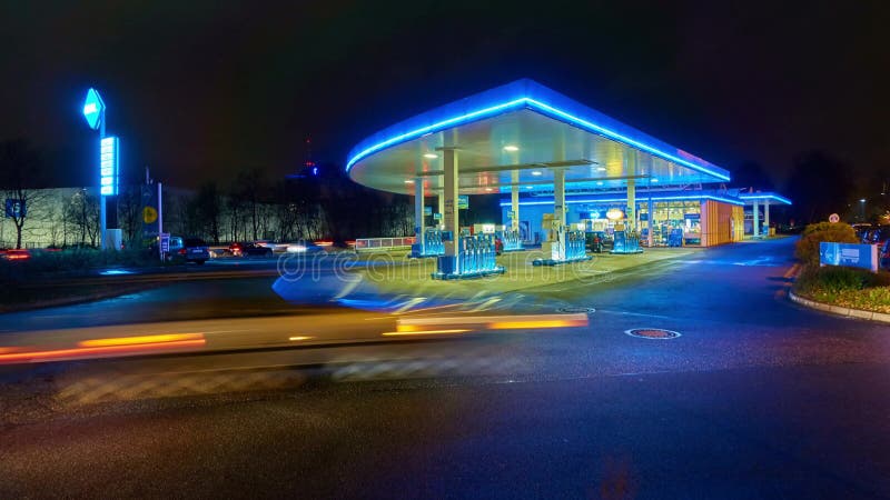 Hannover, Germany - December 09, 2017: Gas Station in Hannover at Night. Time Lapse